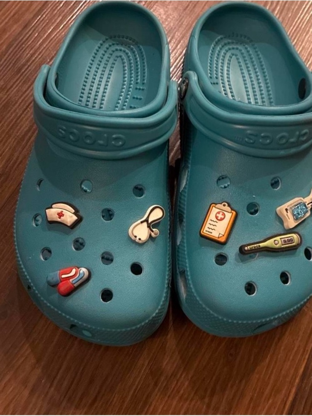 CROCS Teal Slip-On Clogs with Medical-Themed Jibbitz